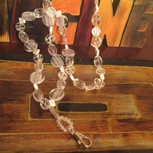 Stretch beaded Lanyard/badge holder. 21 in. long.